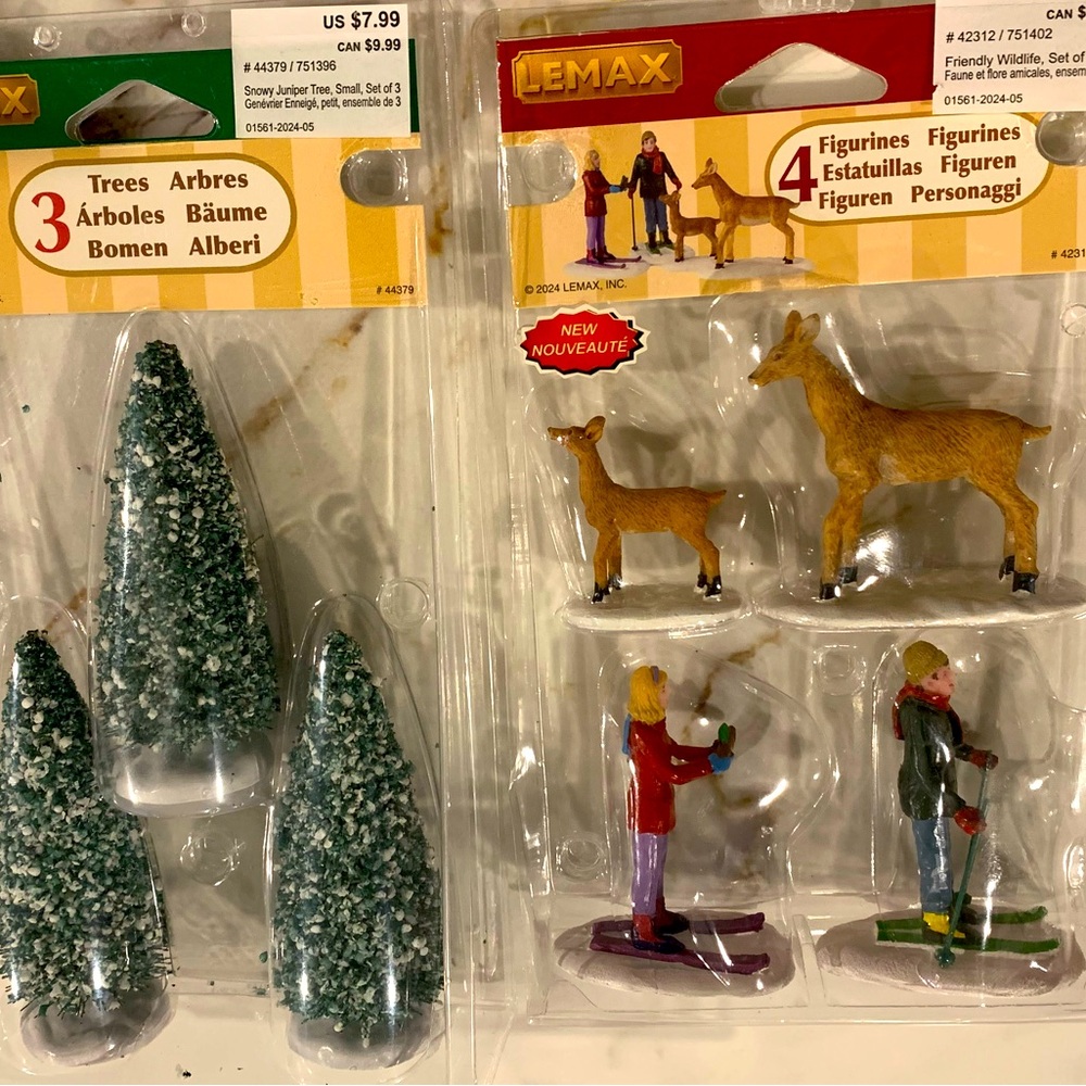 Lemax set of 3 Trees. And bundle a couple of skies and 2 deers